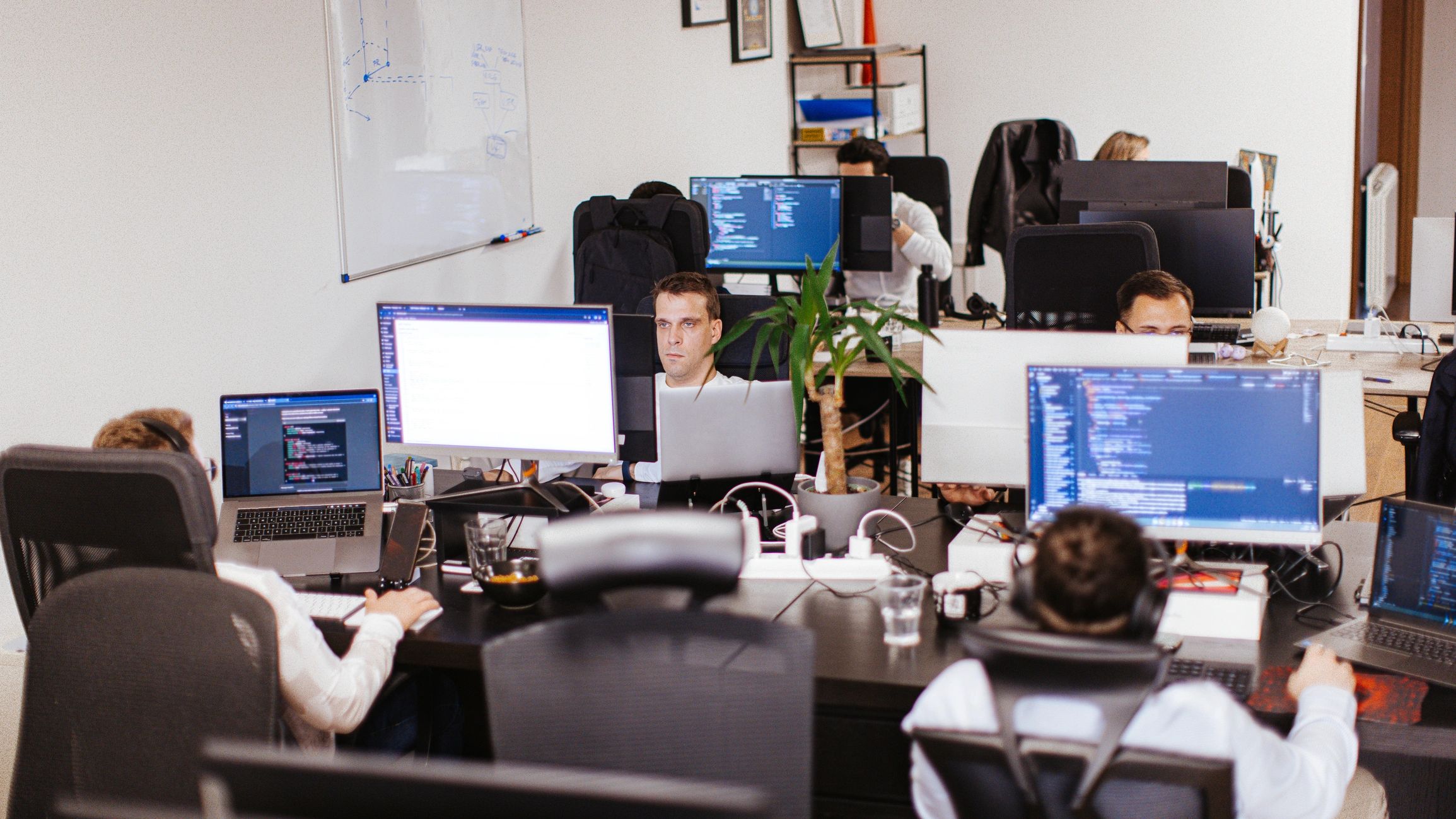 IT support team collaborating in an office