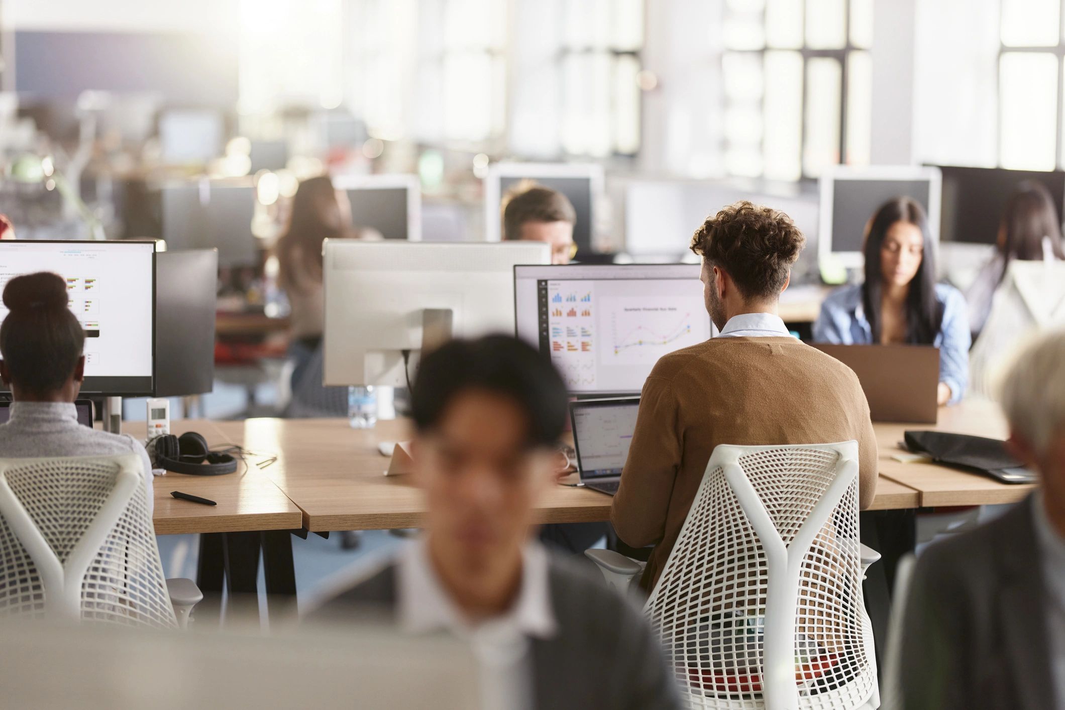 IT professionals collaborating in an office to support business technology